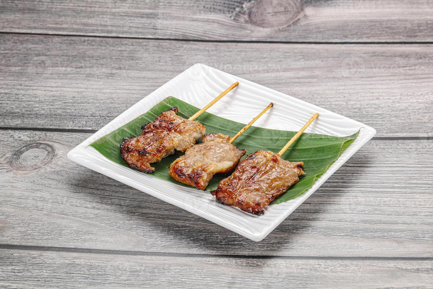 Thai cuisine - grilled pork skewer photo