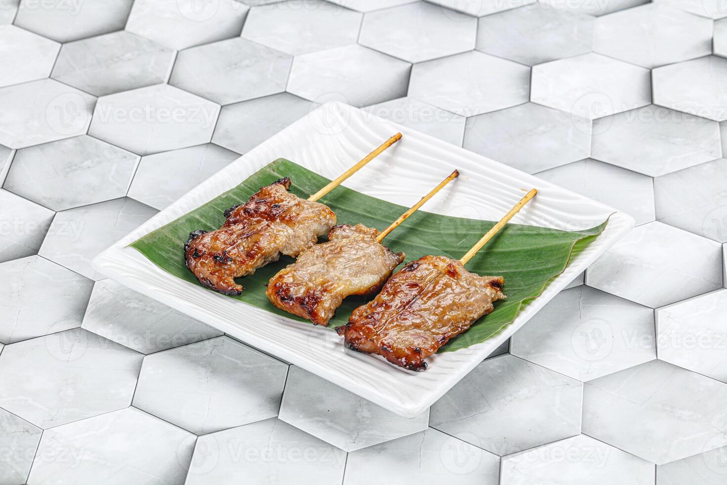 Thai cuisine - grilled pork skewer photo