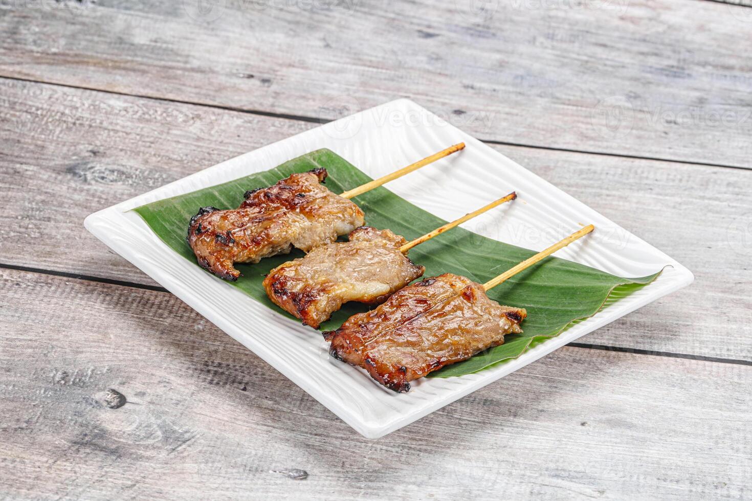Thai cuisine - grilled pork skewer photo