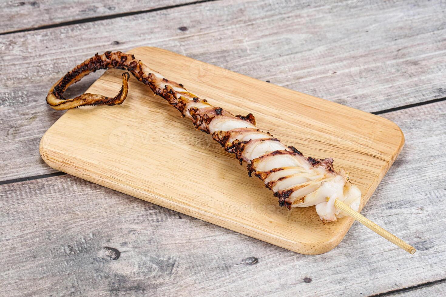 Delicous tasty Grilled octopus tentacle photo