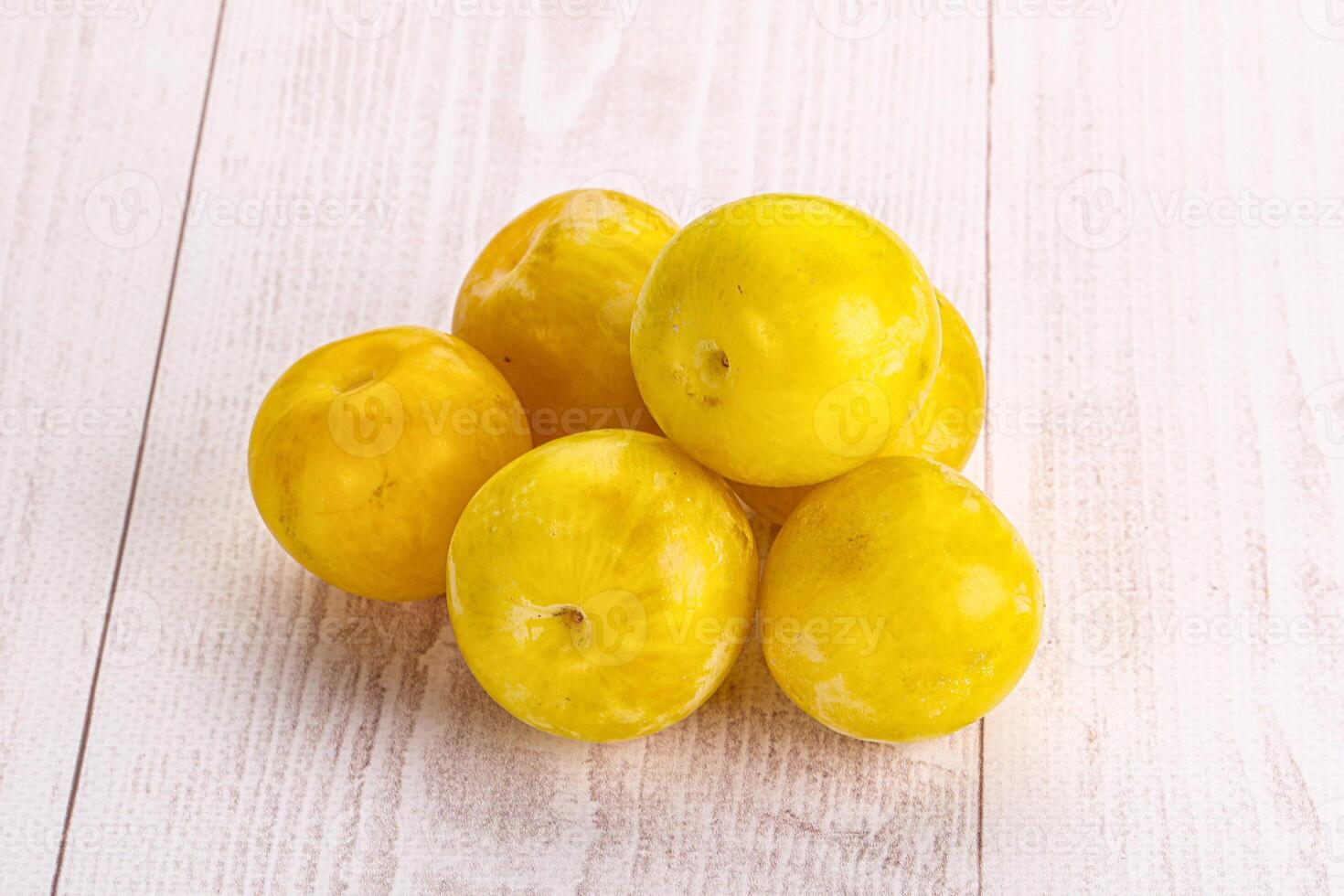 Yellow sweet plum heap fruit photo