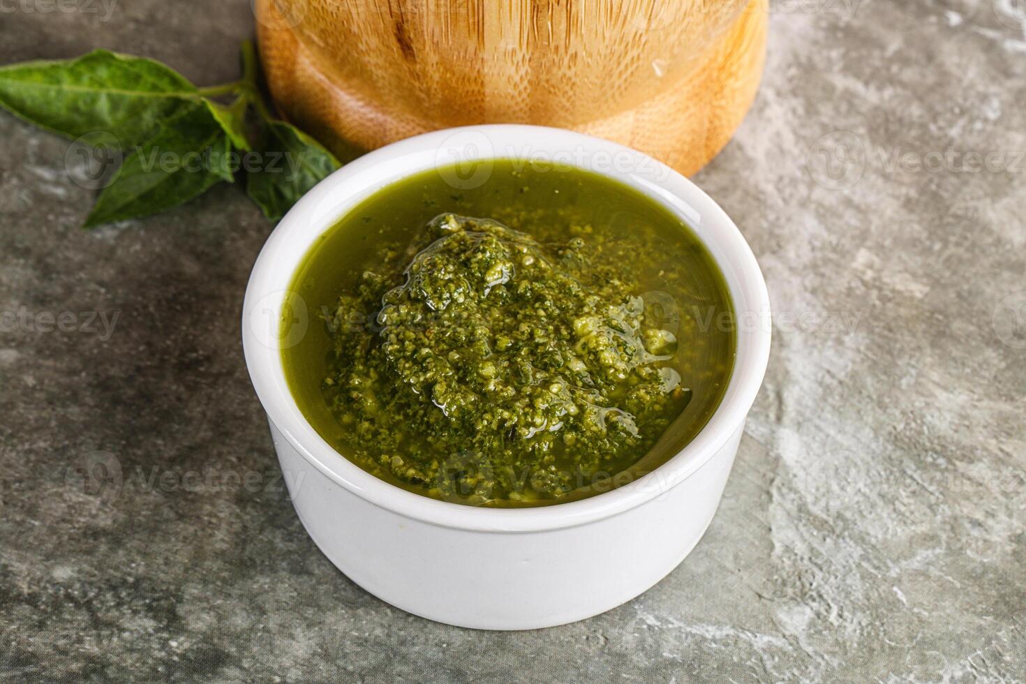 Homemade vegetarian basil pesto sauce photo