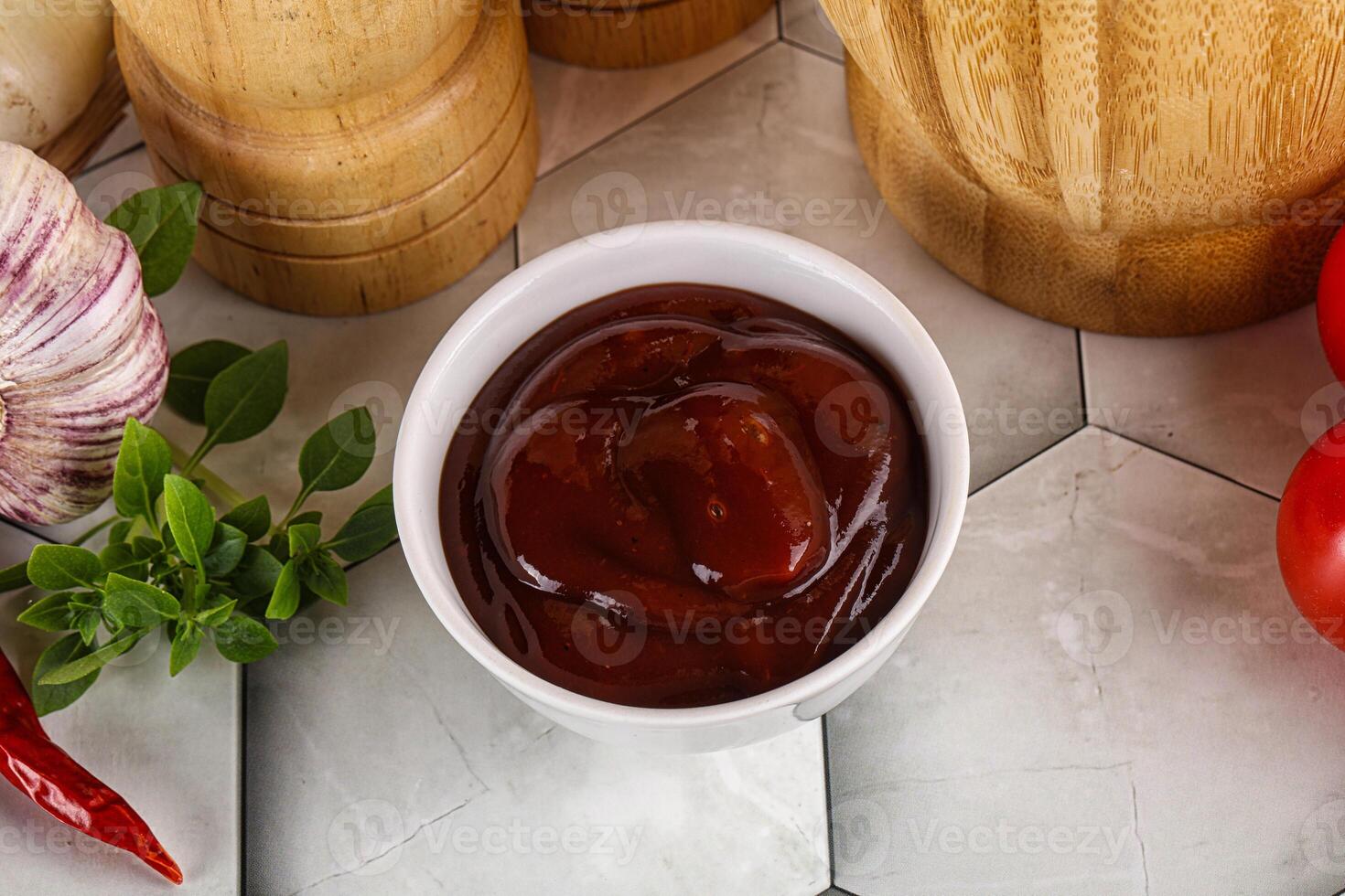 Tasty barbecue sauce in the bowl photo