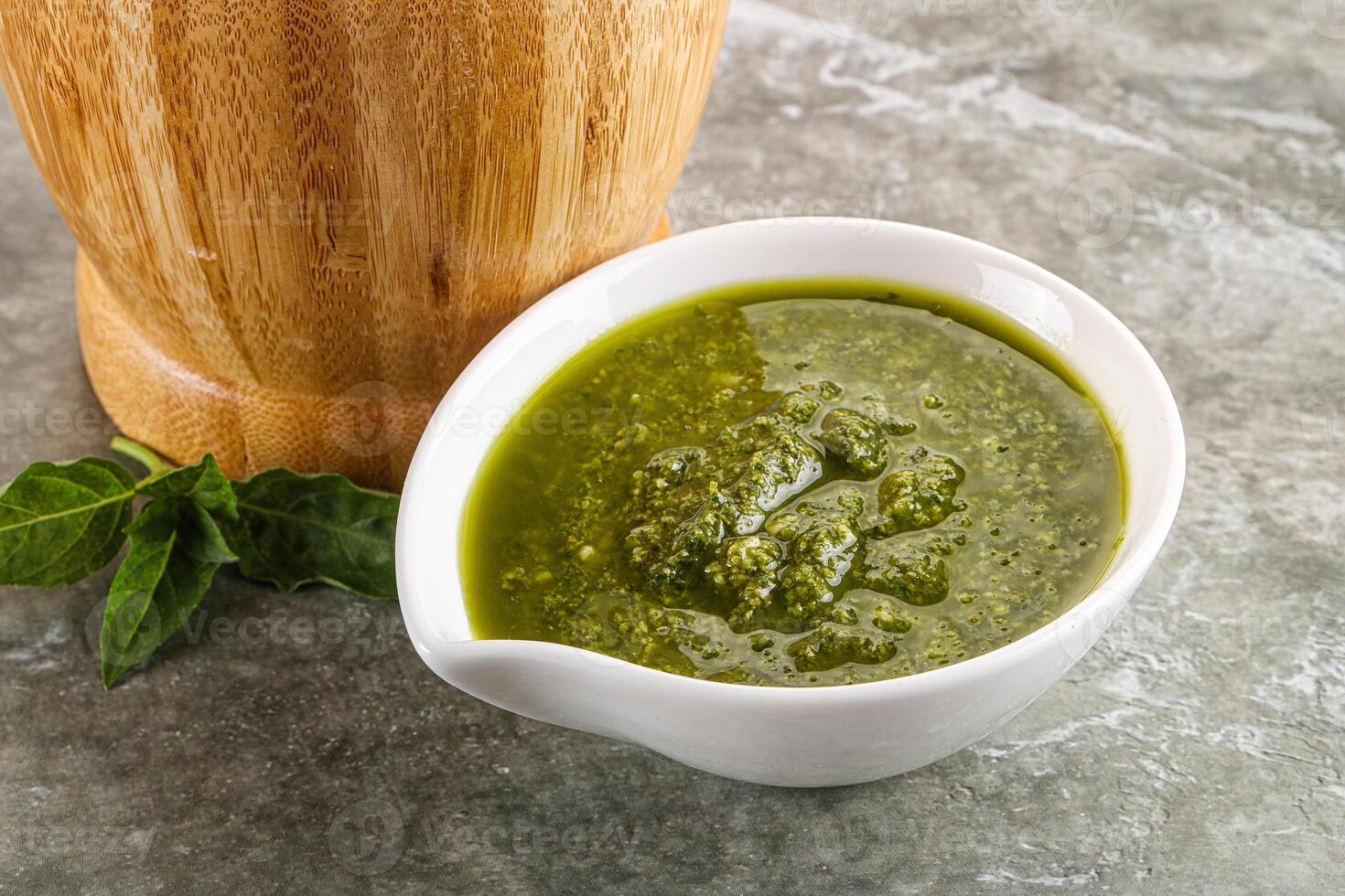 Homemade vegetarian basil pesto sauce photo