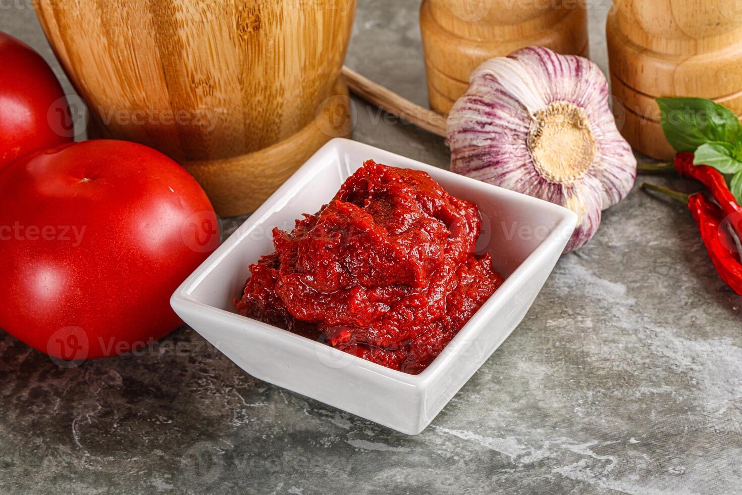 Natural organic red tomato paste photo