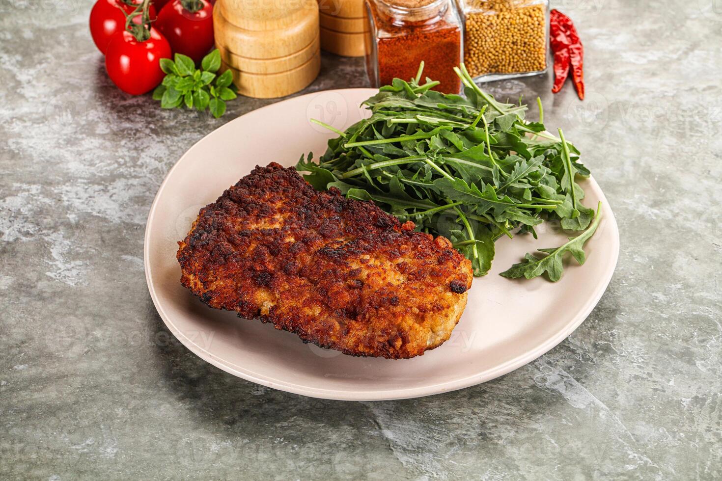 Tasty roasted breaded meat schnitzel photo