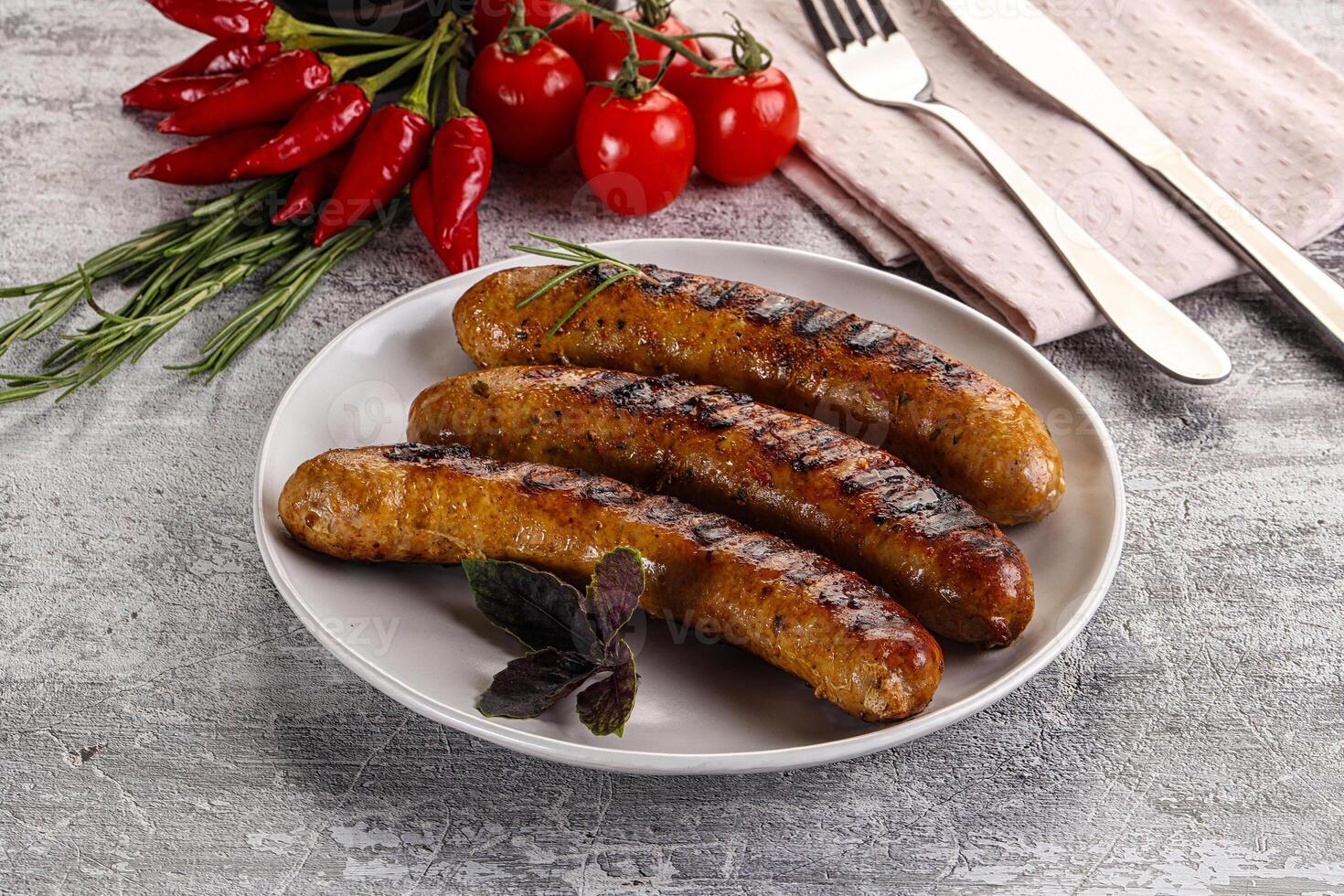 Grilled meat sausages with spices photo