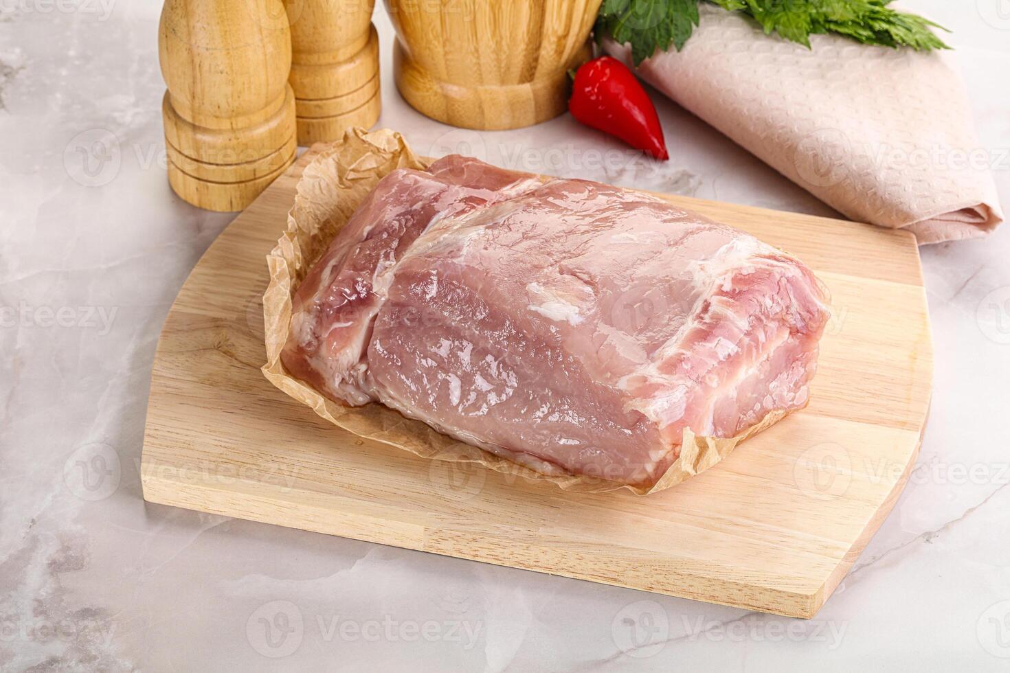 Raw uncooked pork meat loin photo