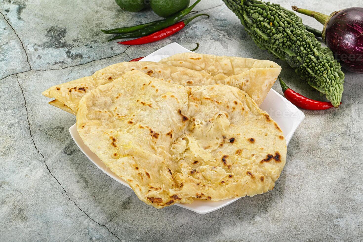 Indian tandori bread - naan with cheese photo