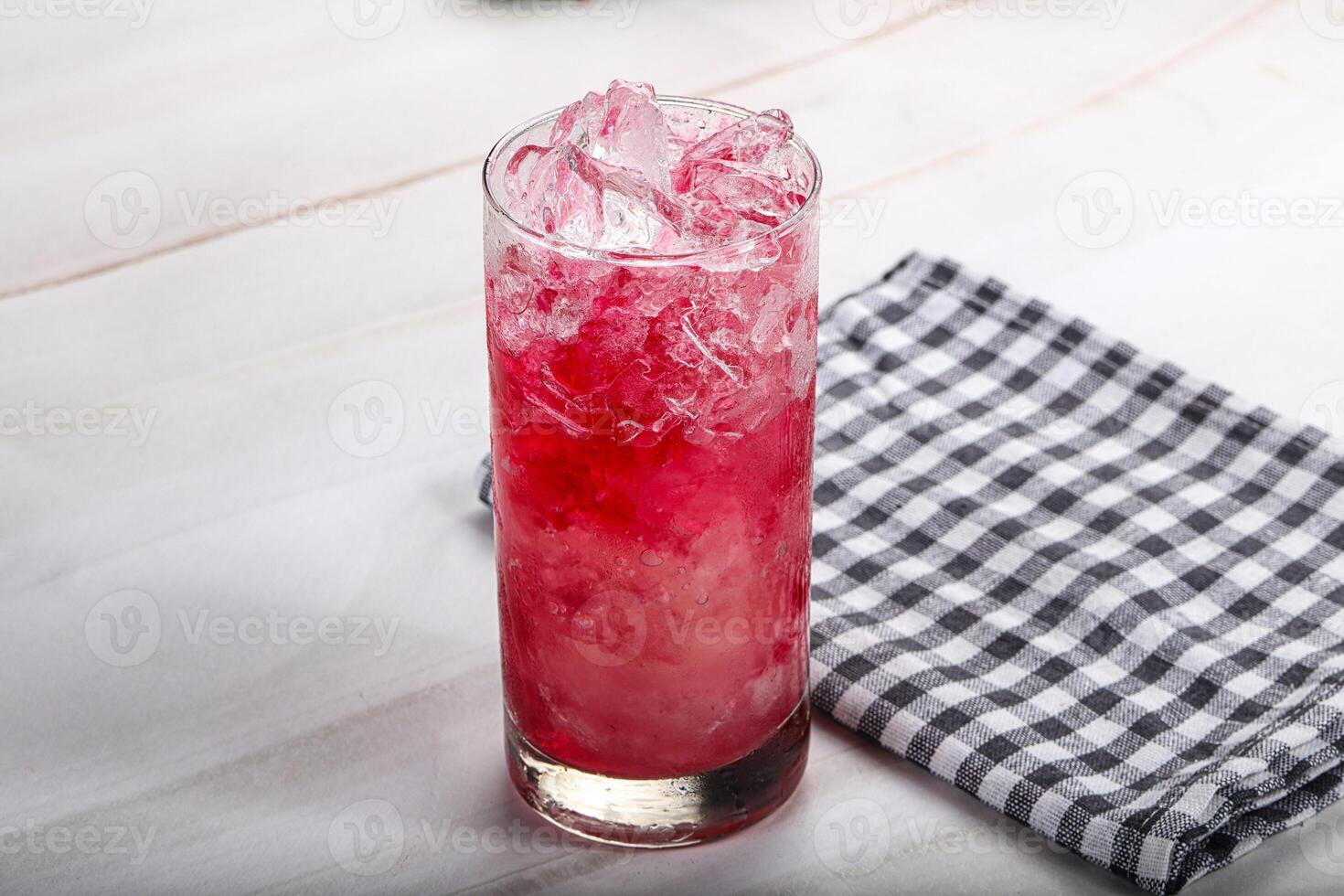Cold strawberry cocktail with ice photo