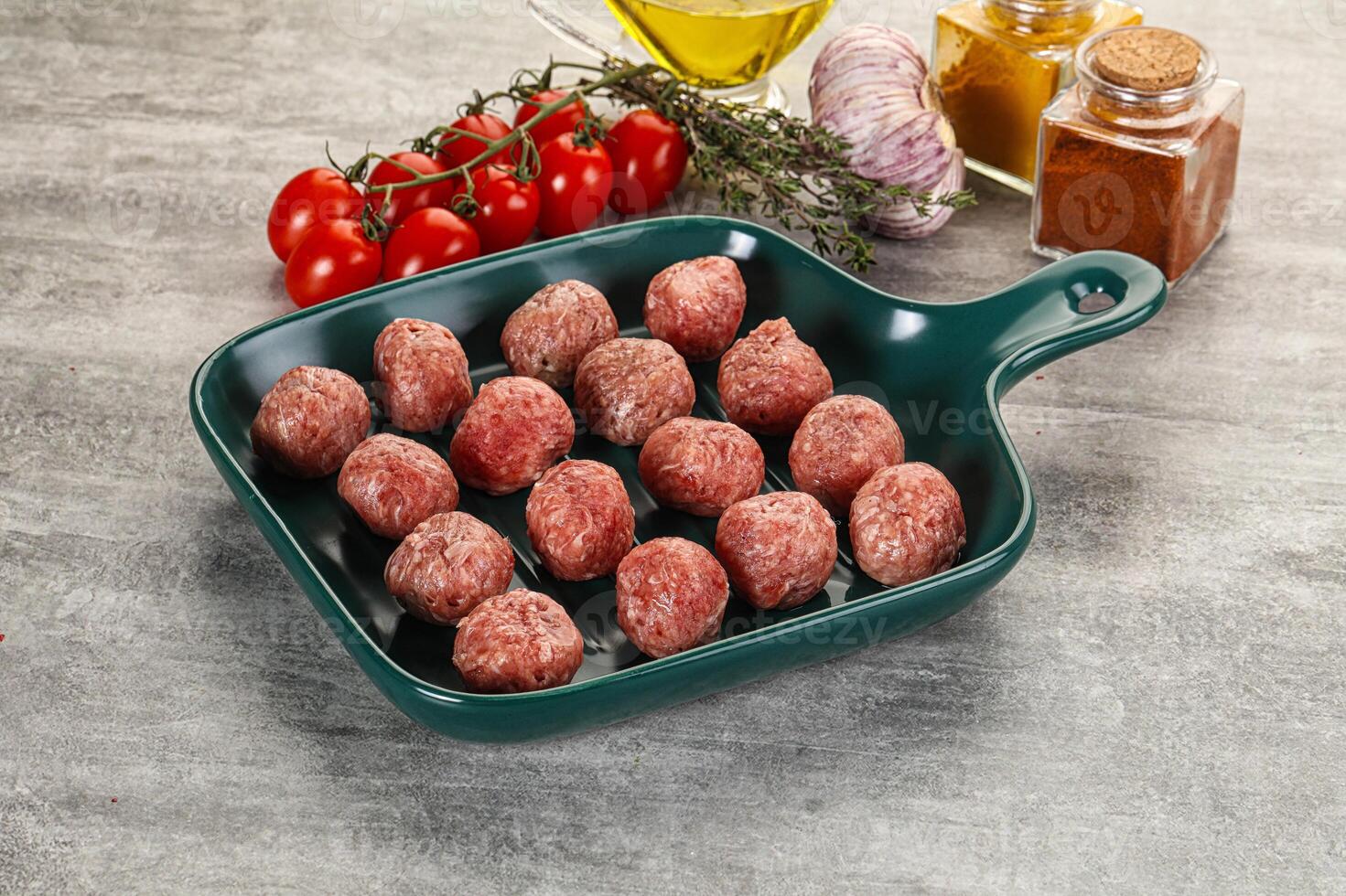 Uncooked raw beef meatball minced photo