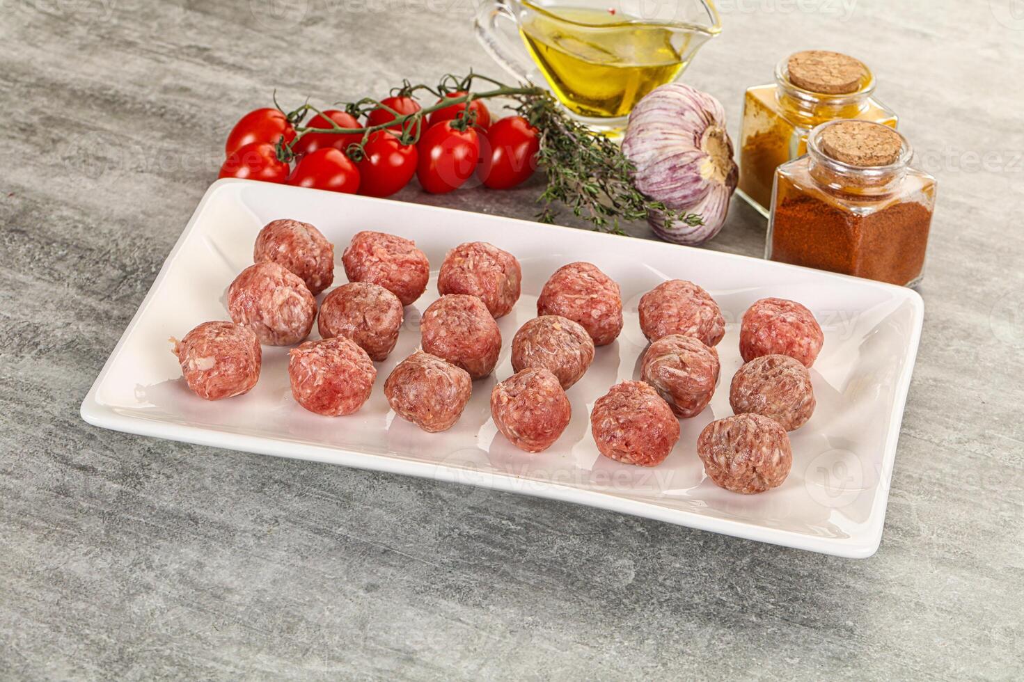 Uncooked raw beef meatball minced photo