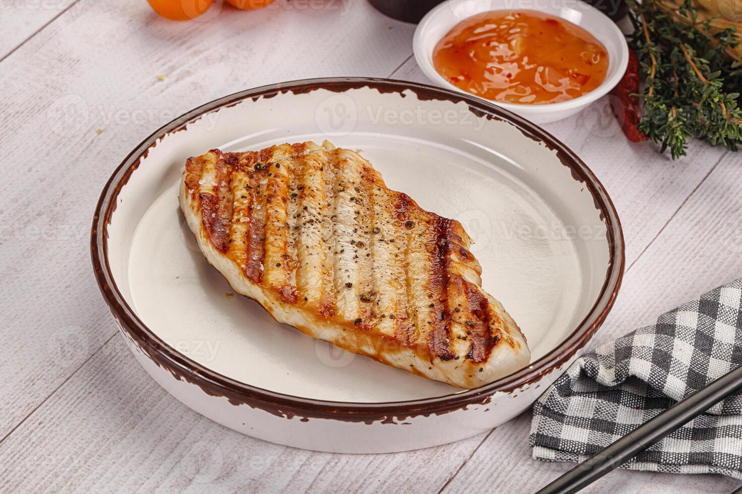 Grilled turkey fillet steak with sauce photo