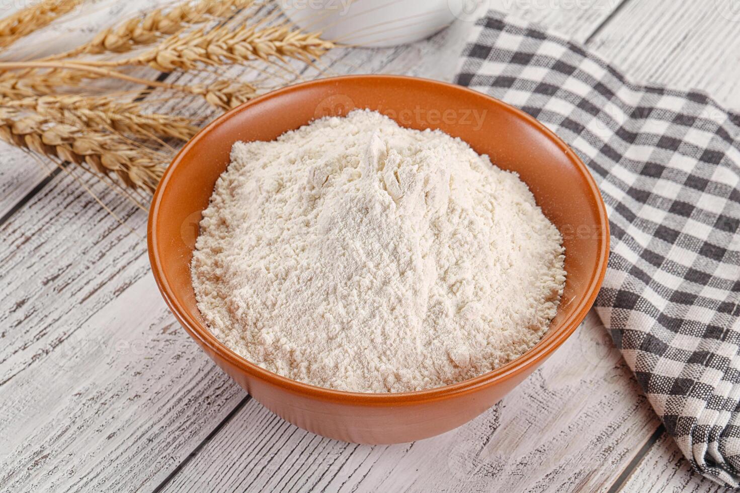 Wheat flour heap for bake photo