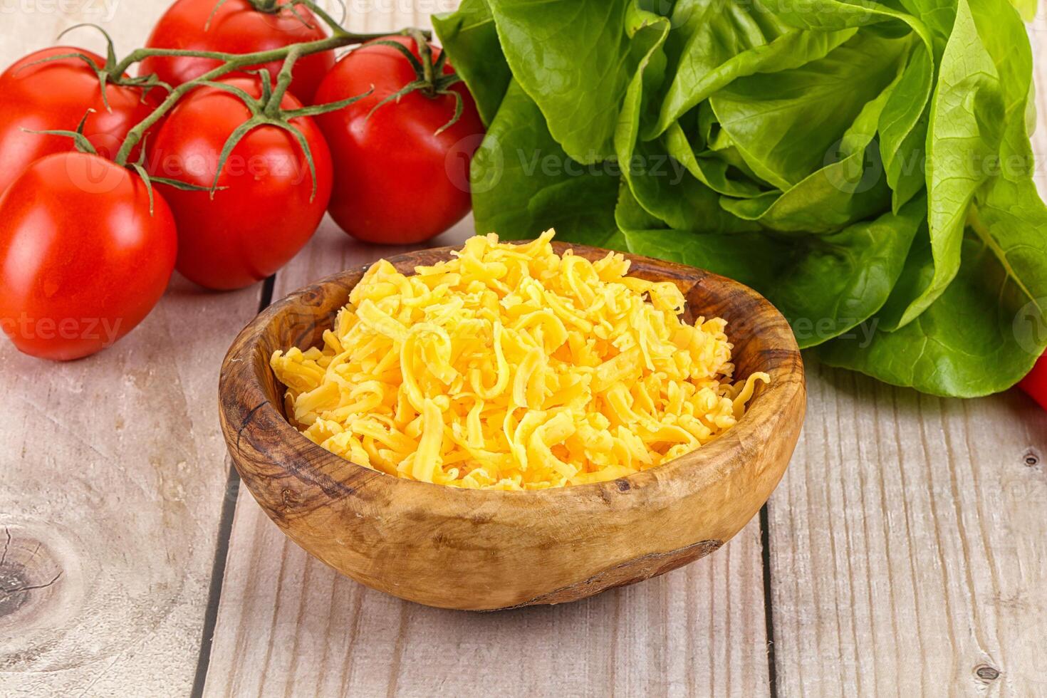 Shredded cheese in the bowl photo