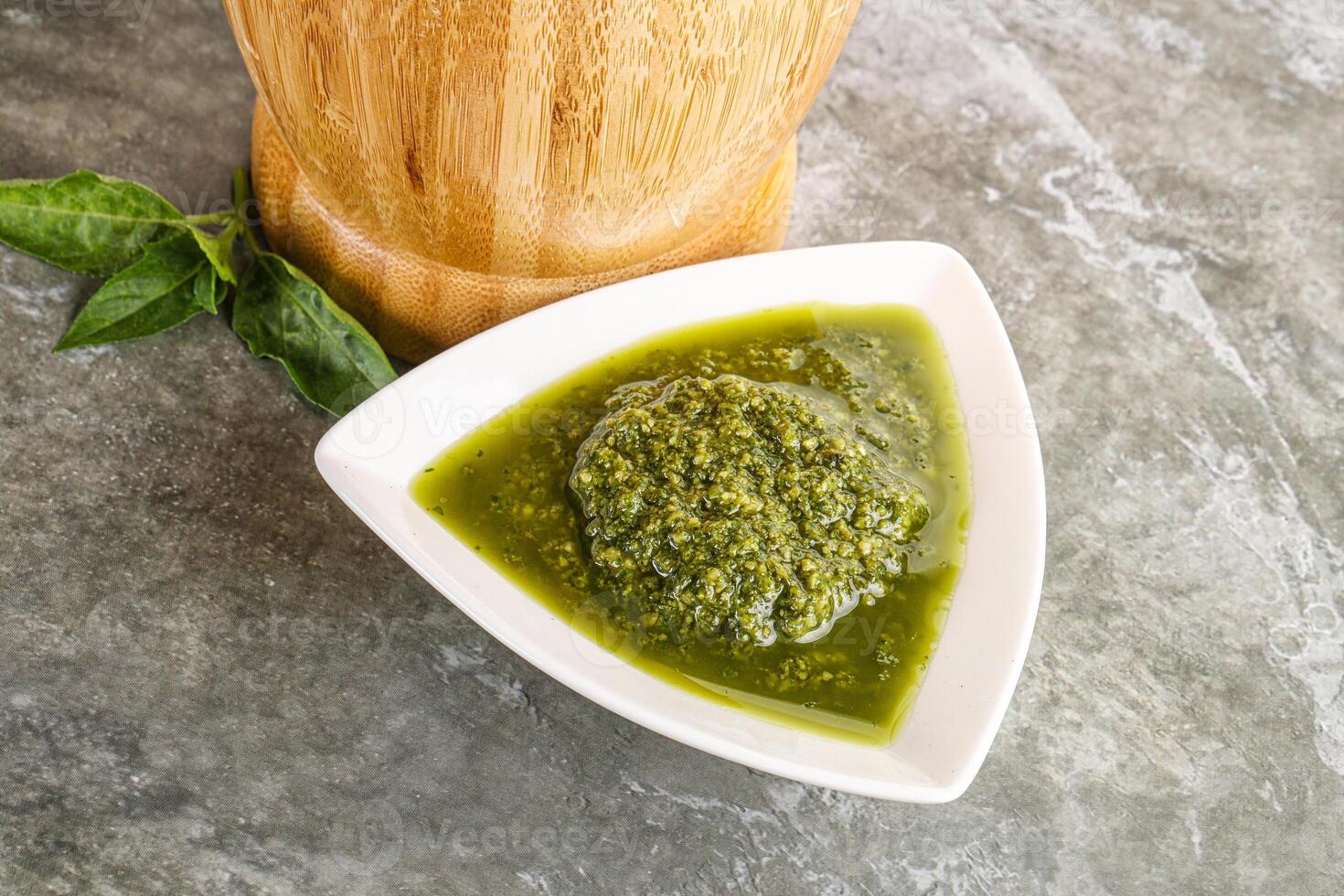 Homemade vegetarian basil pesto sauce photo