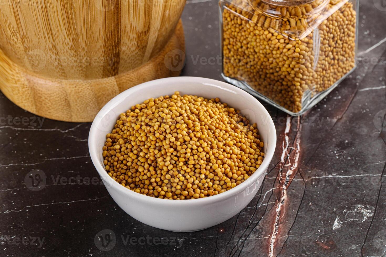 Mustard dry seeds in the bowl photo