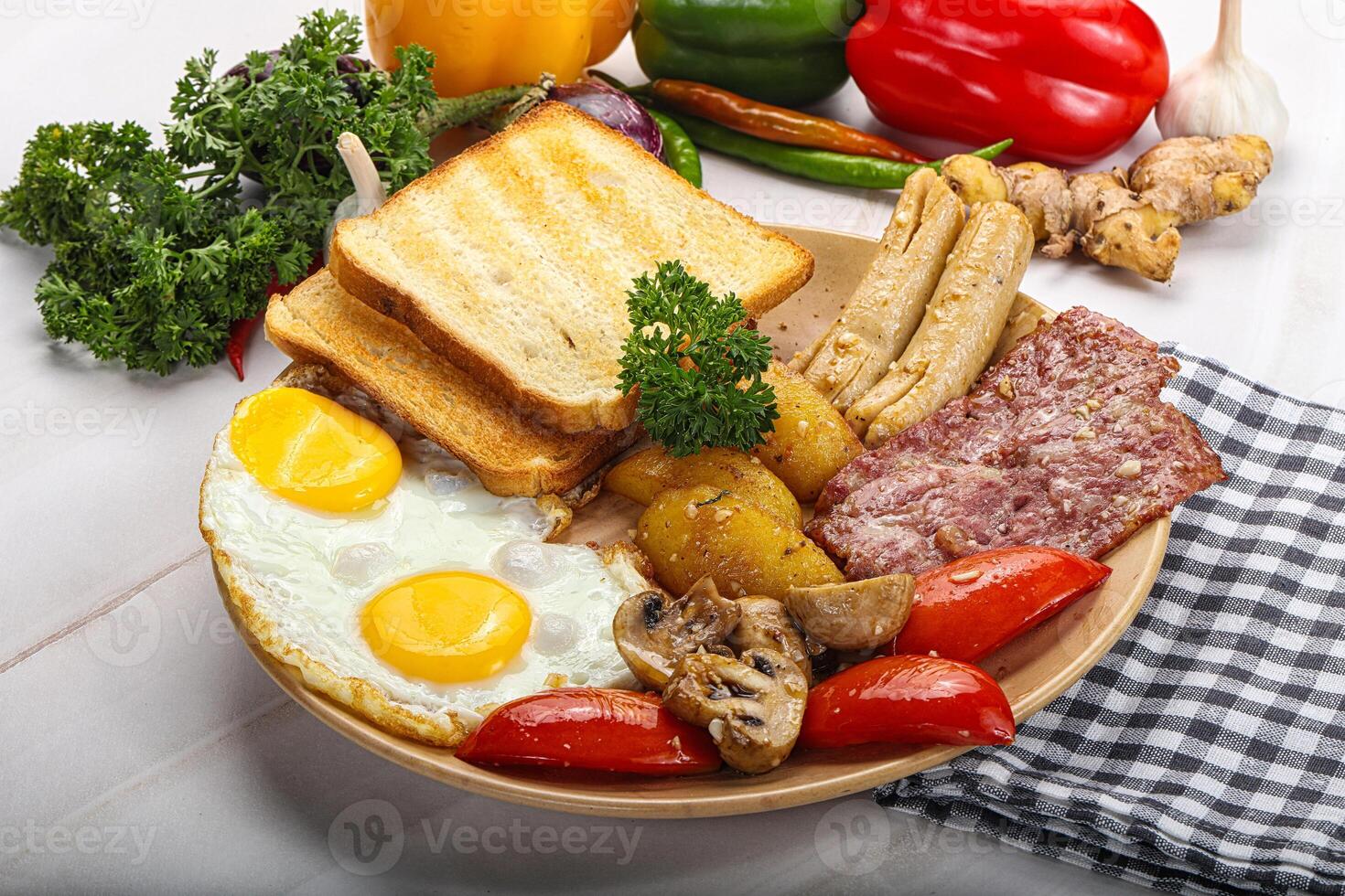 English breakfast with toast, egg and sausages photo