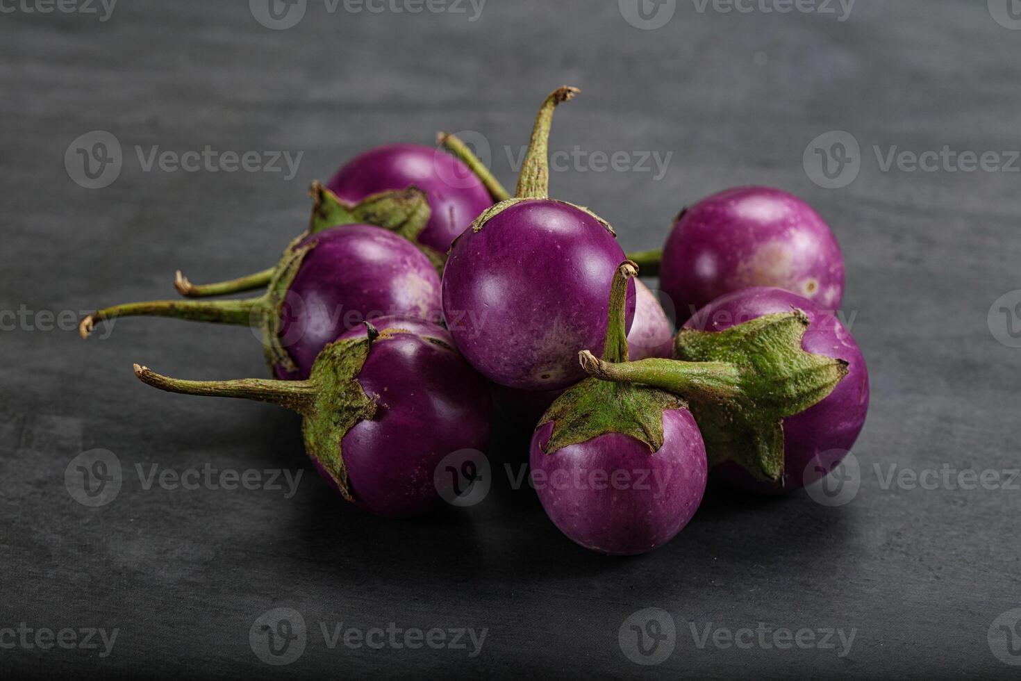 Raw small purple asian baby eggplant photo