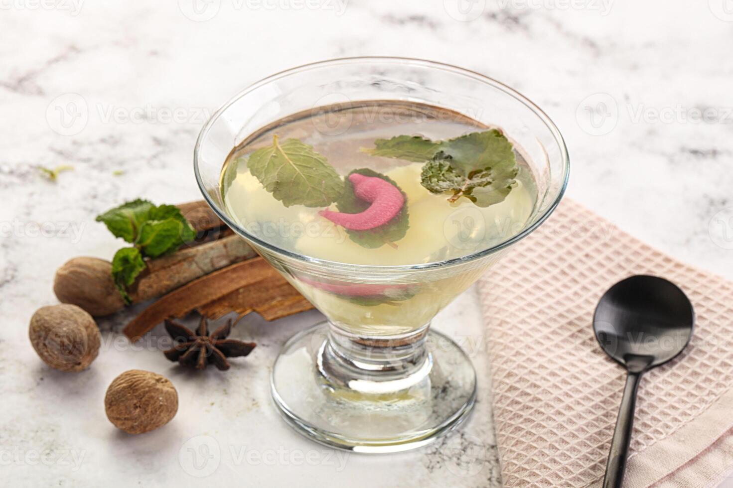 Sweet pineapple jelly with mint photo
