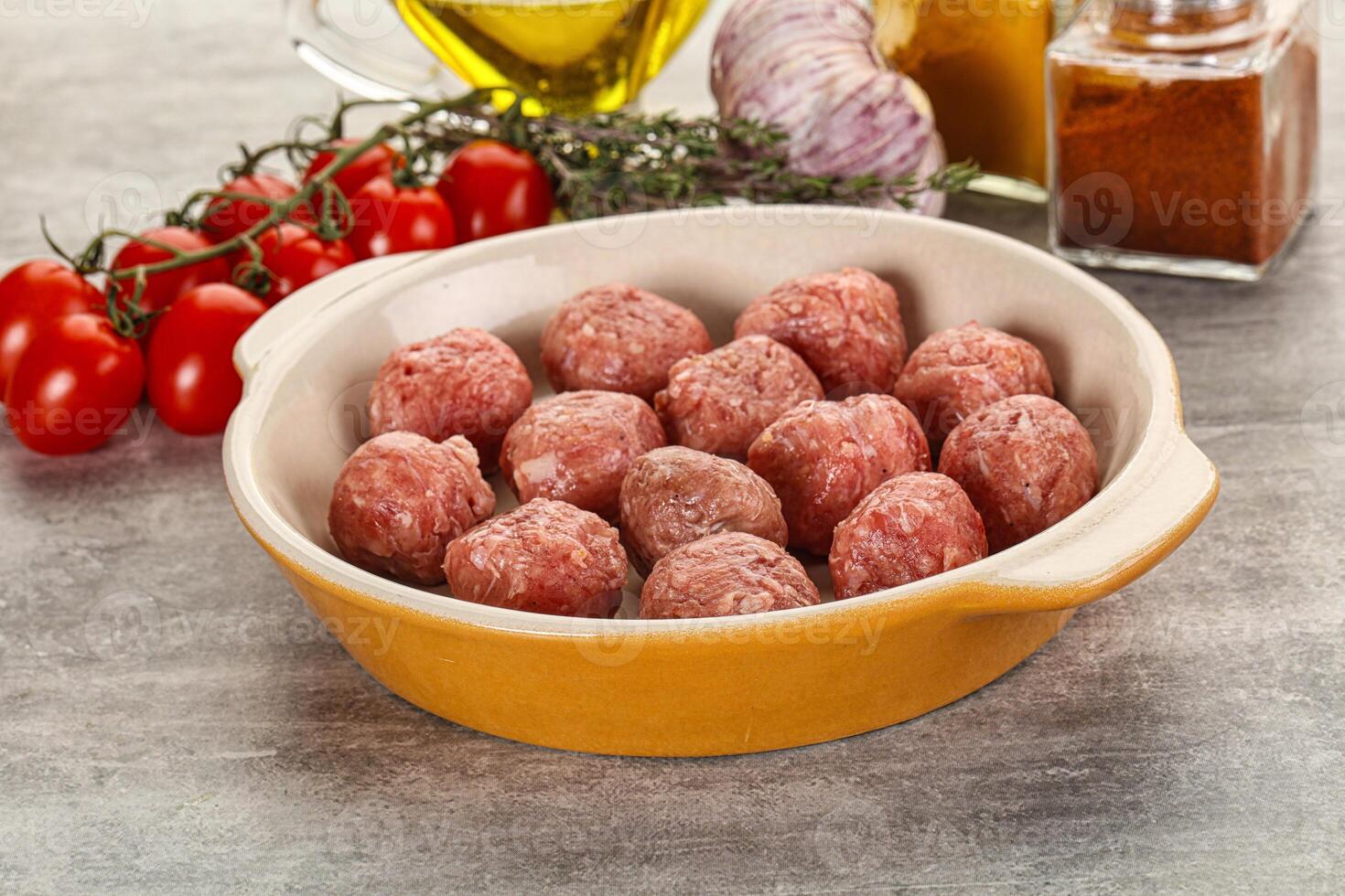 Uncooked raw beef meatball minced photo