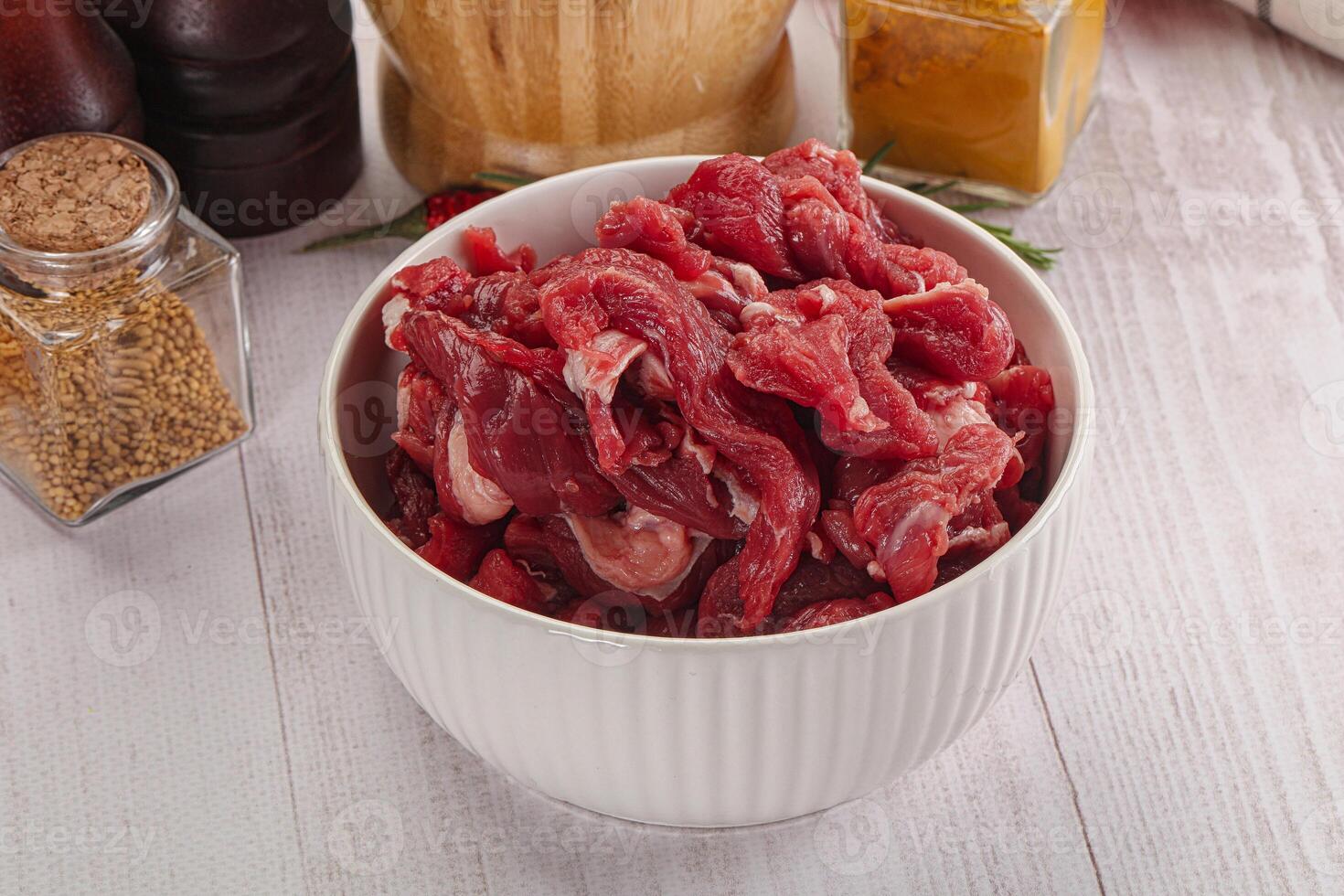 Raw beef meat - sliced strips photo