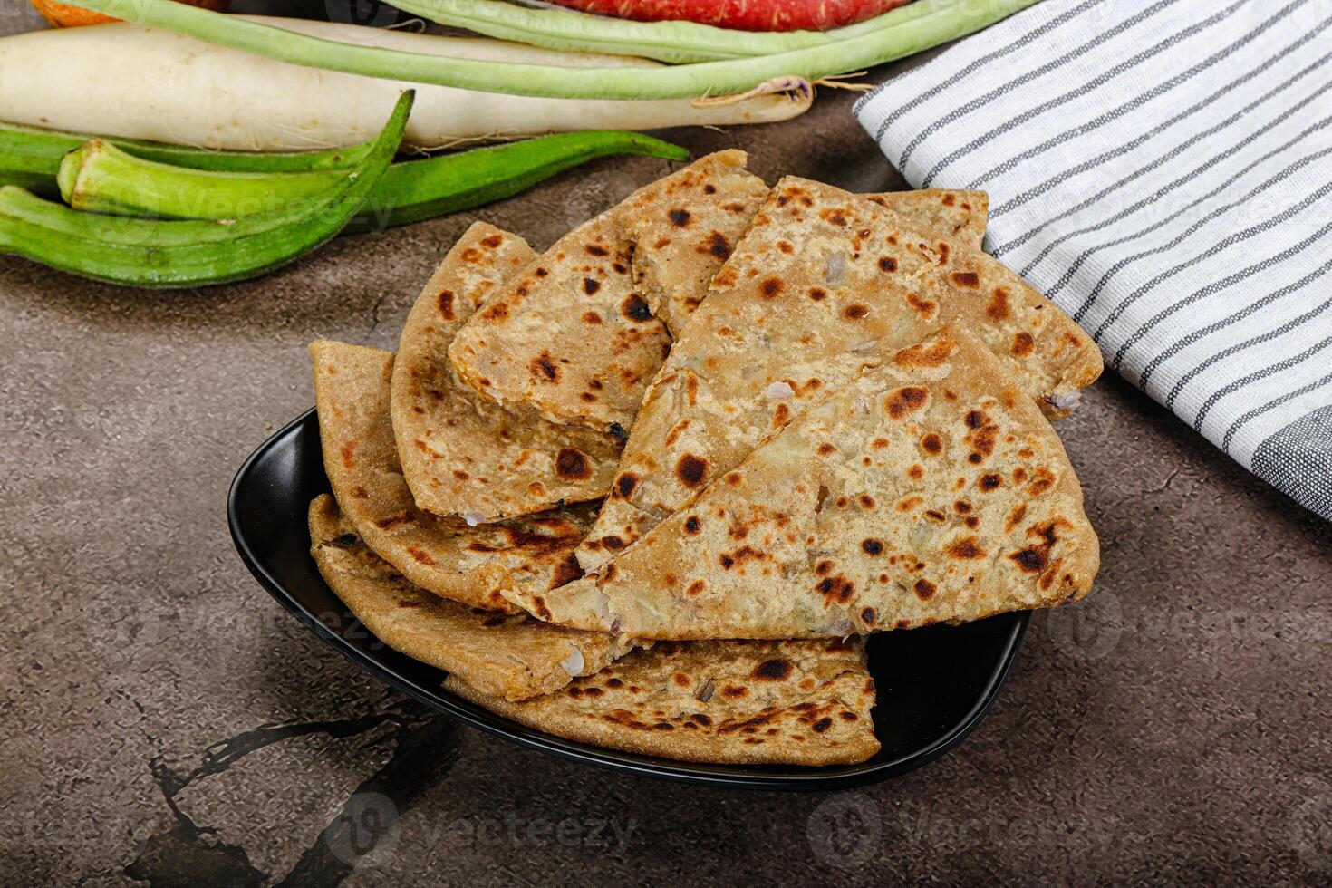 Indian Aloo Paratha - bread with potato photo