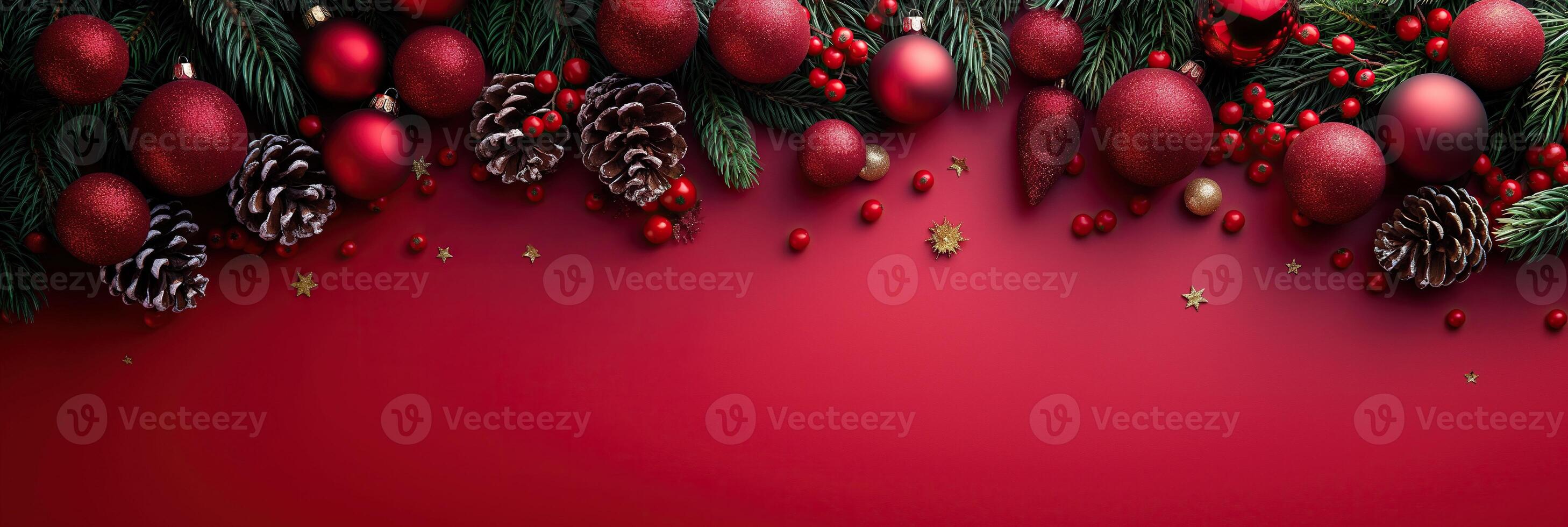 A red background with a bunch of red and gold Christmas ornaments photo