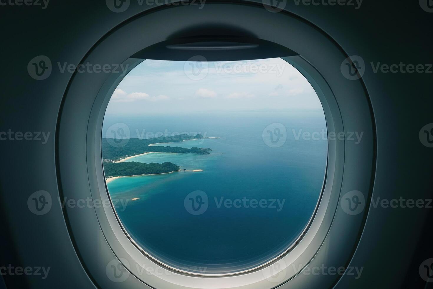 A view of the ocean from an airplane window photo