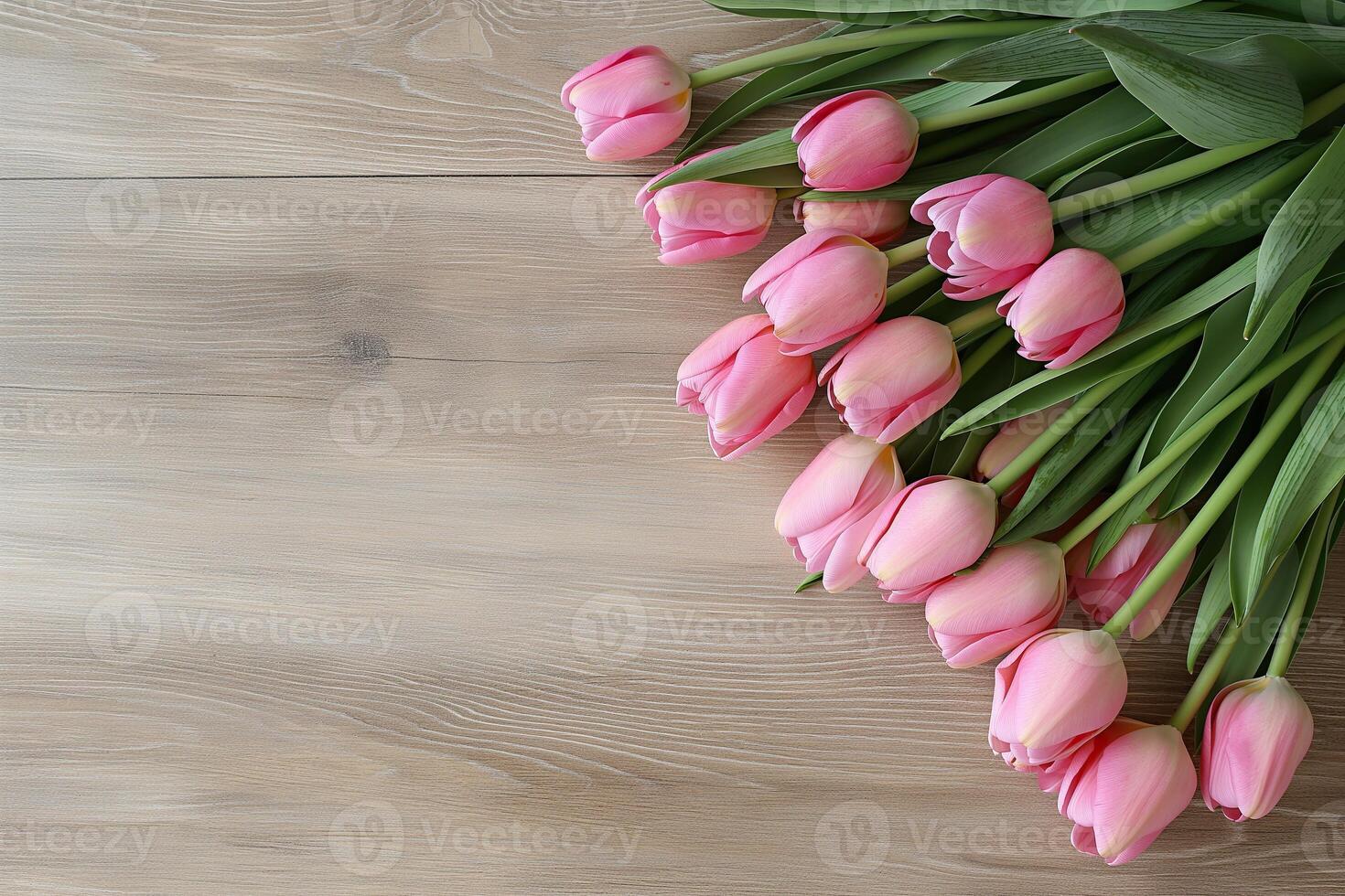 Elegant pink tulips bouquet on rustic wood, perfect for springtime decor photo