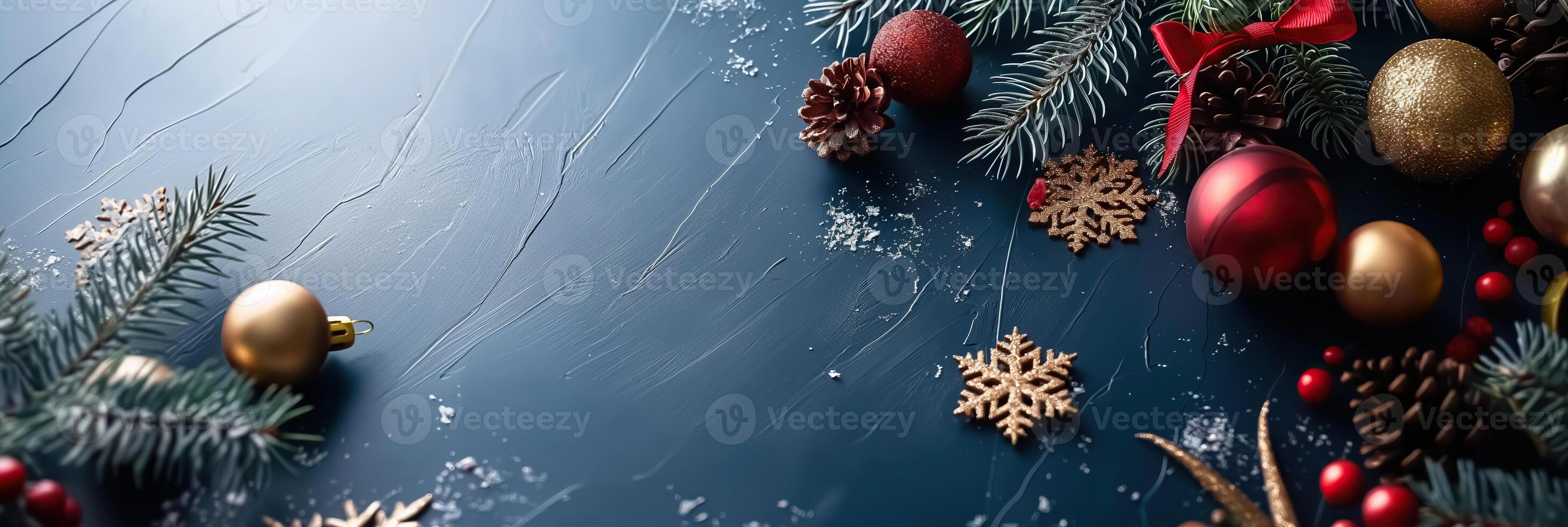 A blue background with a bunch of Christmas decorations including red photo