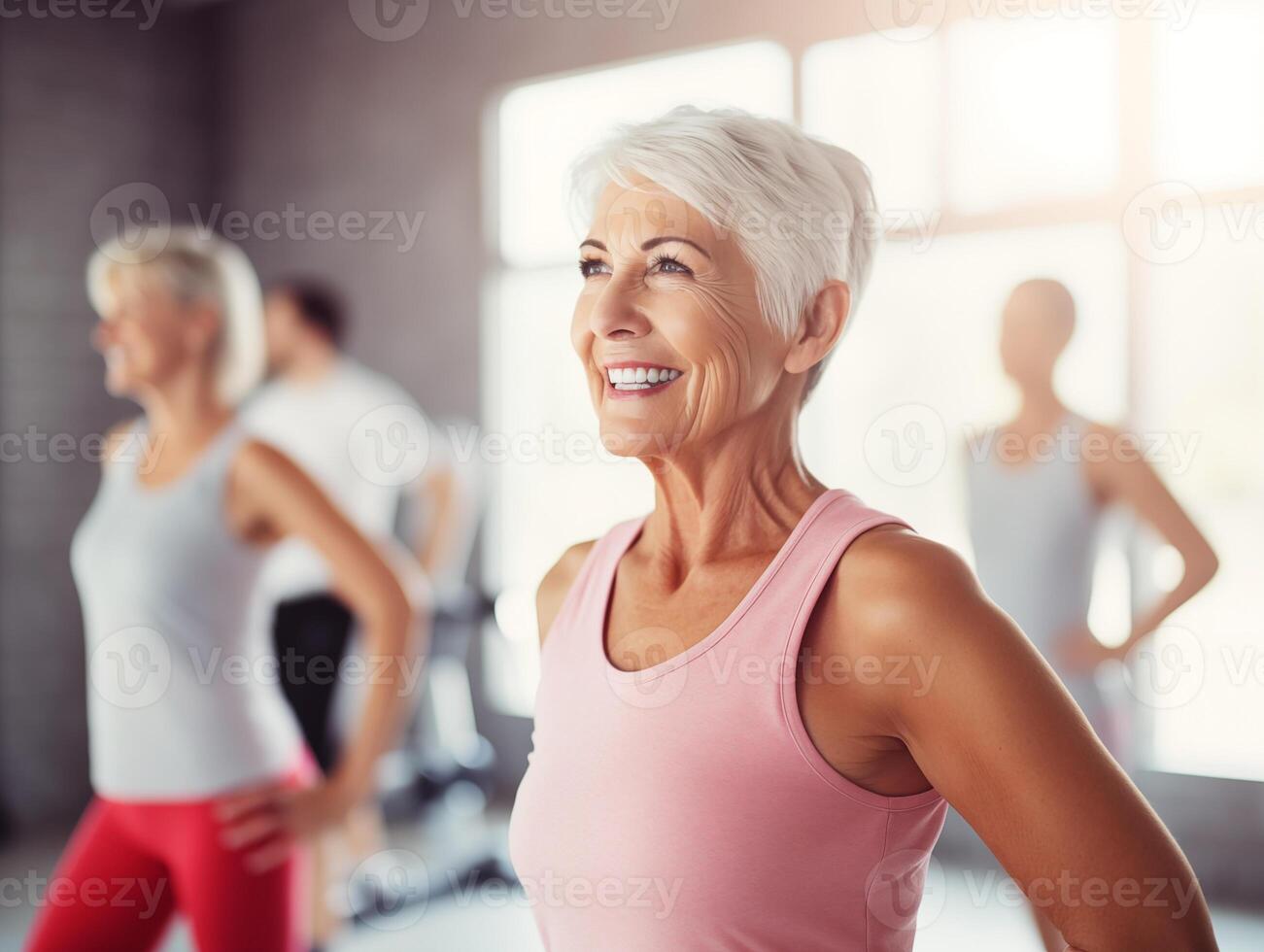 Middle-aged women enjoying fitness class. The concept of active life photo