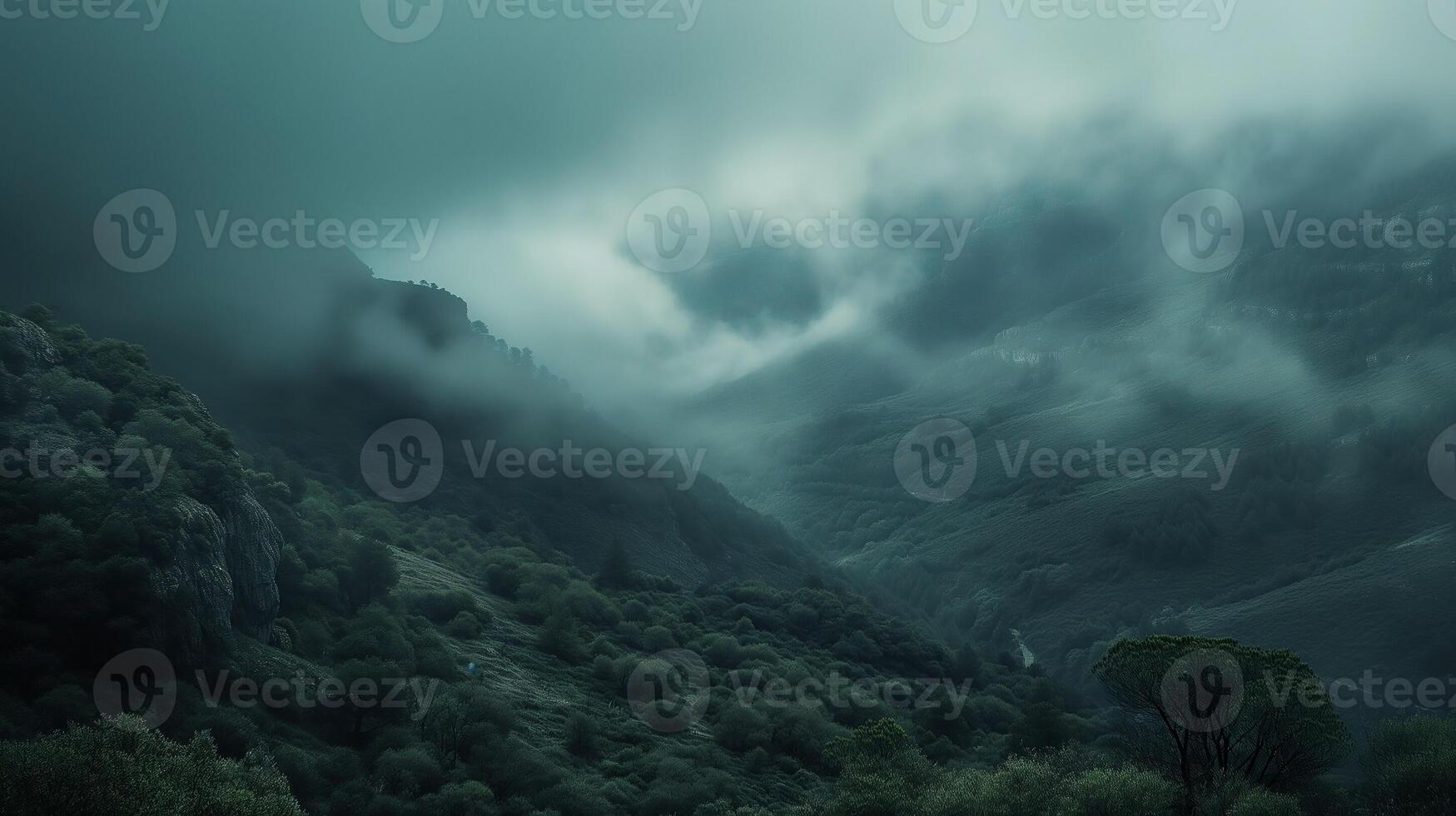 Ethereal mountain landscape enveloped in mist with undulating terrain photo