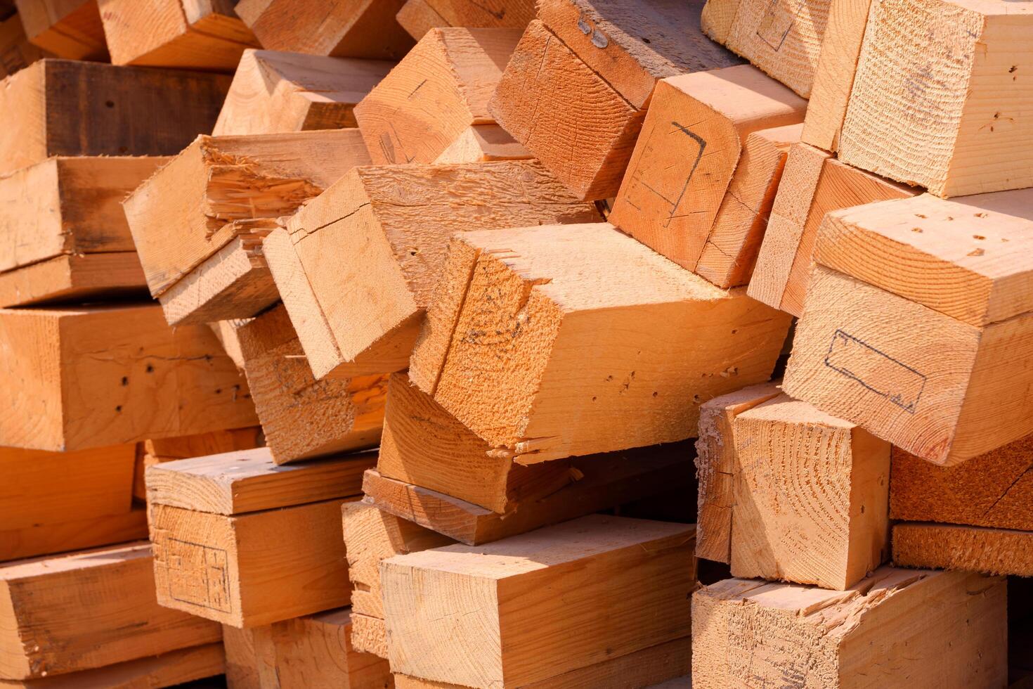 Group of timbers from the old wooden pallets are taken apart for reusable and recycling concept, close up shot photo