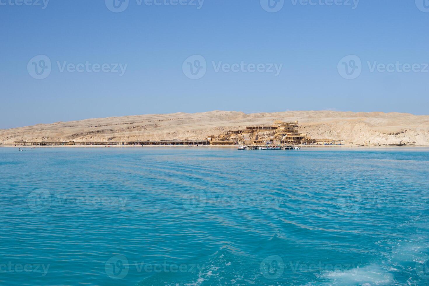 Beach Relaxation at the Red Sea. Fairy-tale Moments of a Sunny Day. The concept of tourism and sea travel photo