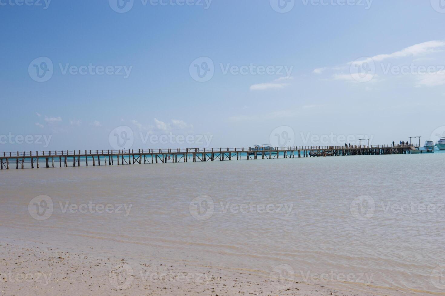 Beach Relaxation at the Red Sea. Fairy-tale Moments of a Sunny Day. The concept of tourism and sea travel photo