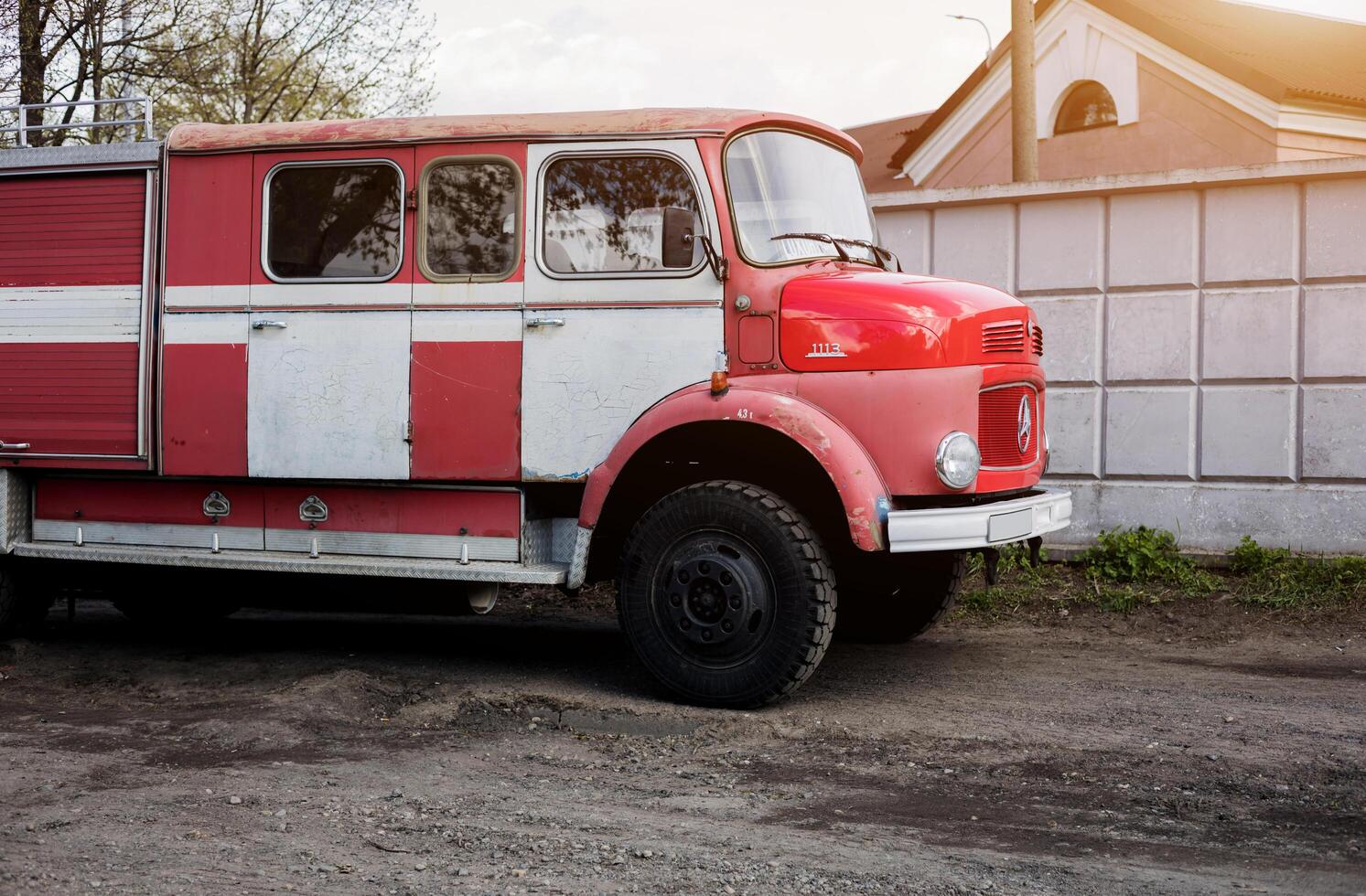 Minsk, Belarus, April 18, 2024 - Old Red vintage automobile Mercedes-Benz photo