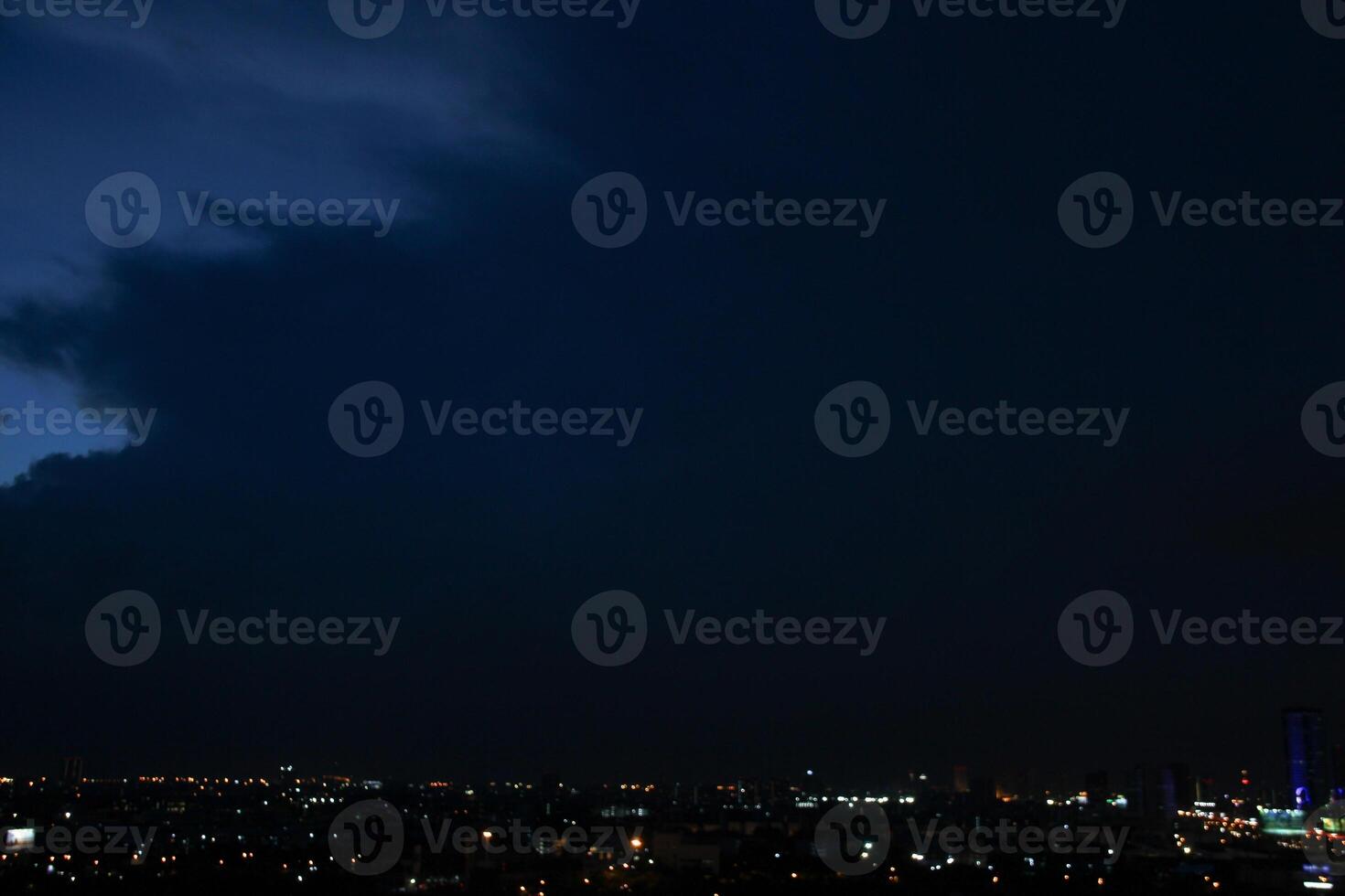 heaven cloudy sky day evening dusk time with sunlight ray from between clouds with city town background photo