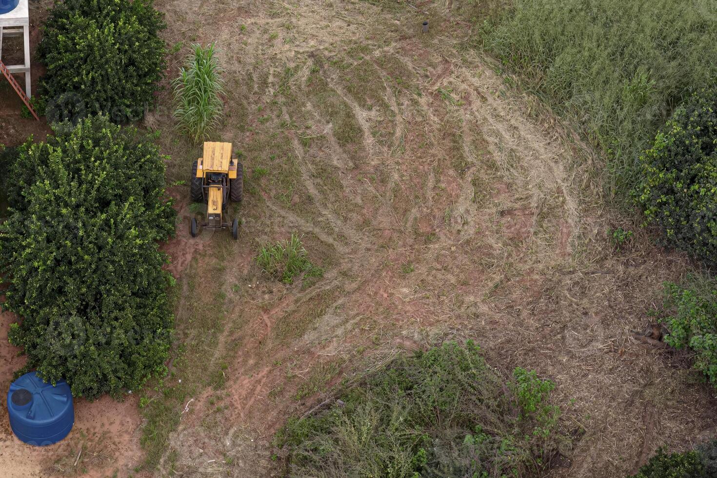 rural farm space with old tractor photo