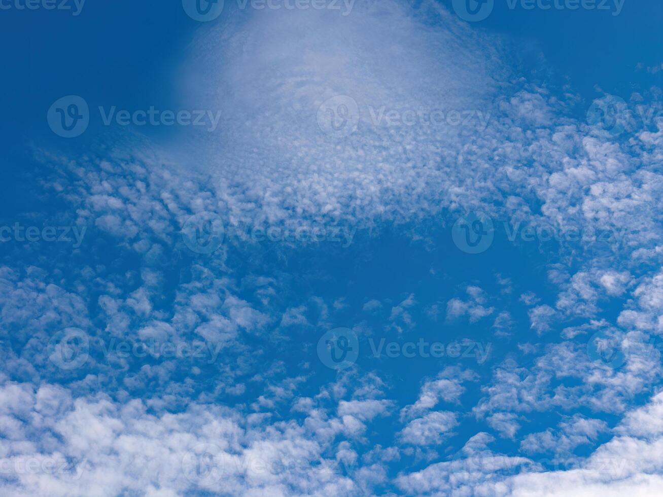 Blue sky with white clouds photo
