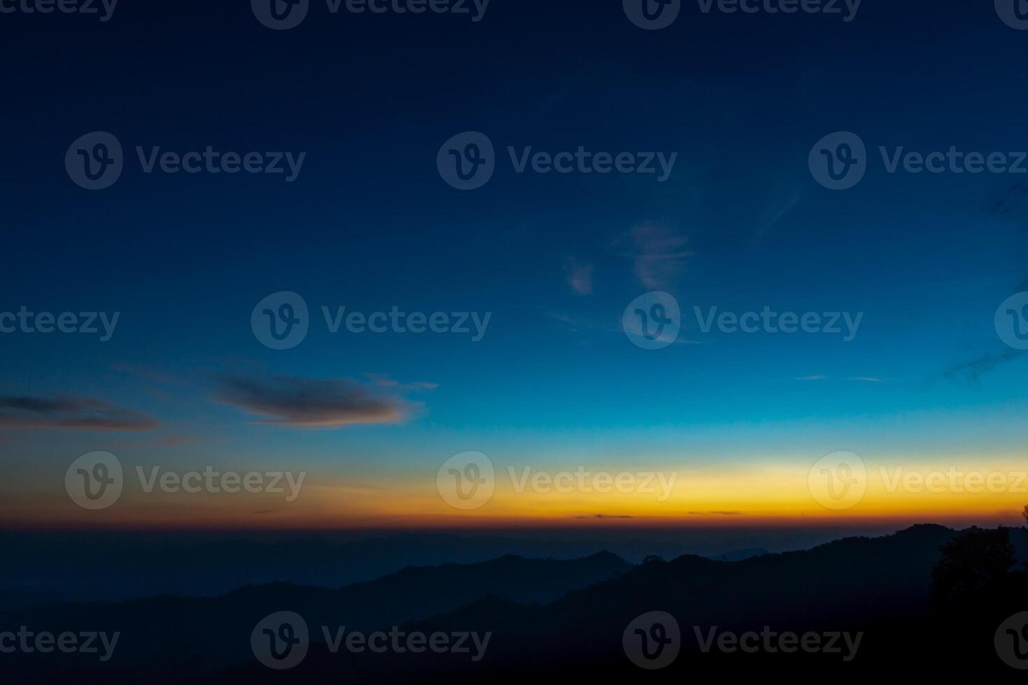 Silhouettes Mountain and Sky before sunrise photo