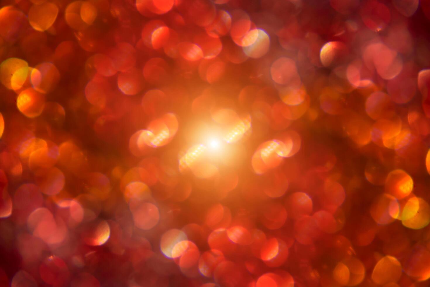 Red sparkling bokeh background with light. photo