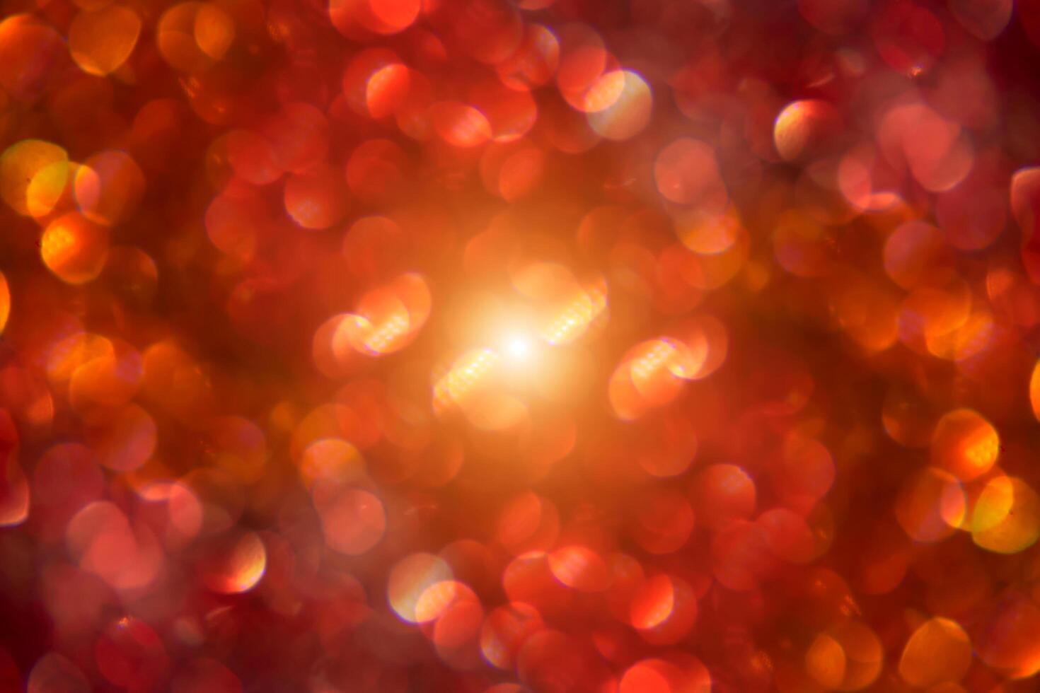 Red sparkling bokeh background with light. photo