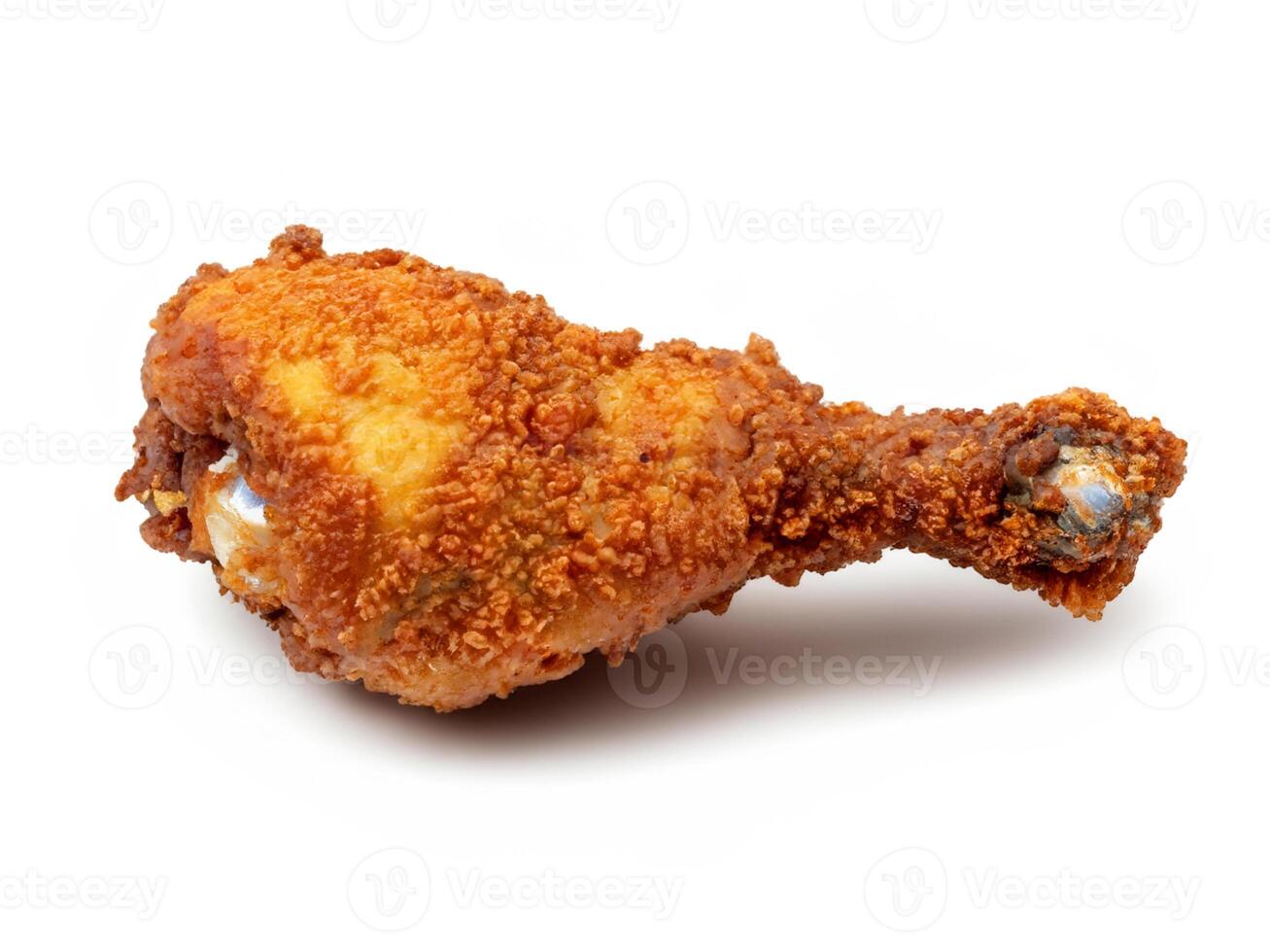 chicken drumsticks on a white background photo