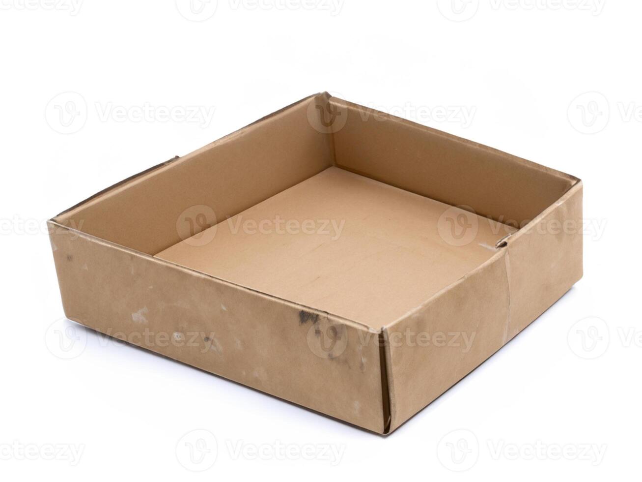 empty open cardboard box isolated on white background photo