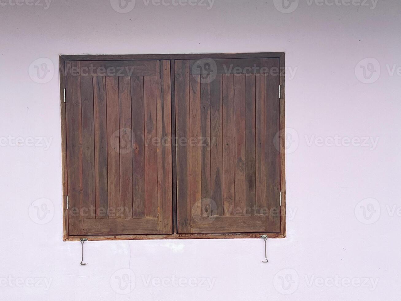 empty wood window with pink wall background photo