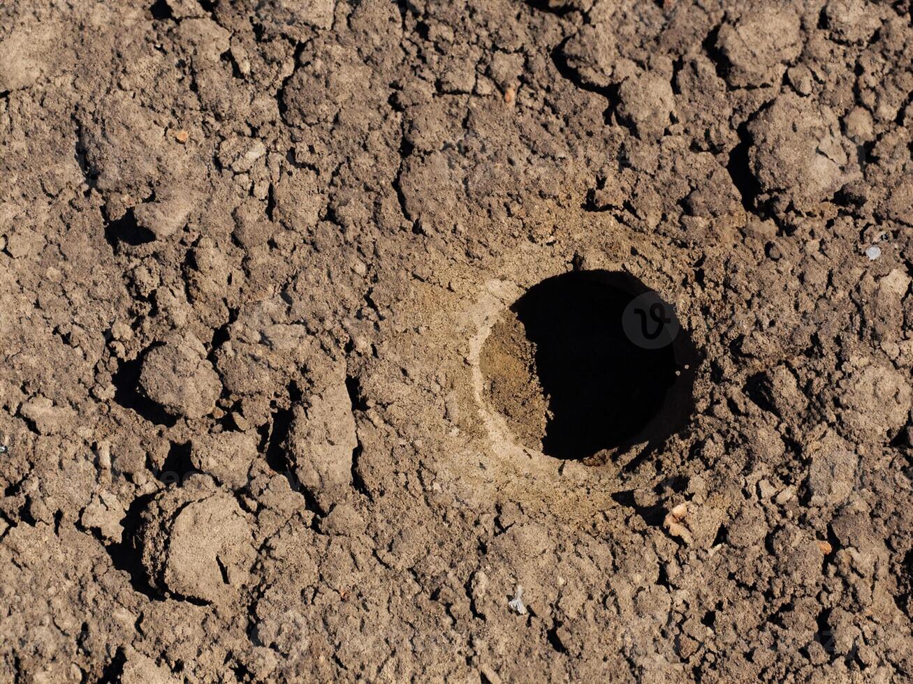 hole in the ground photo