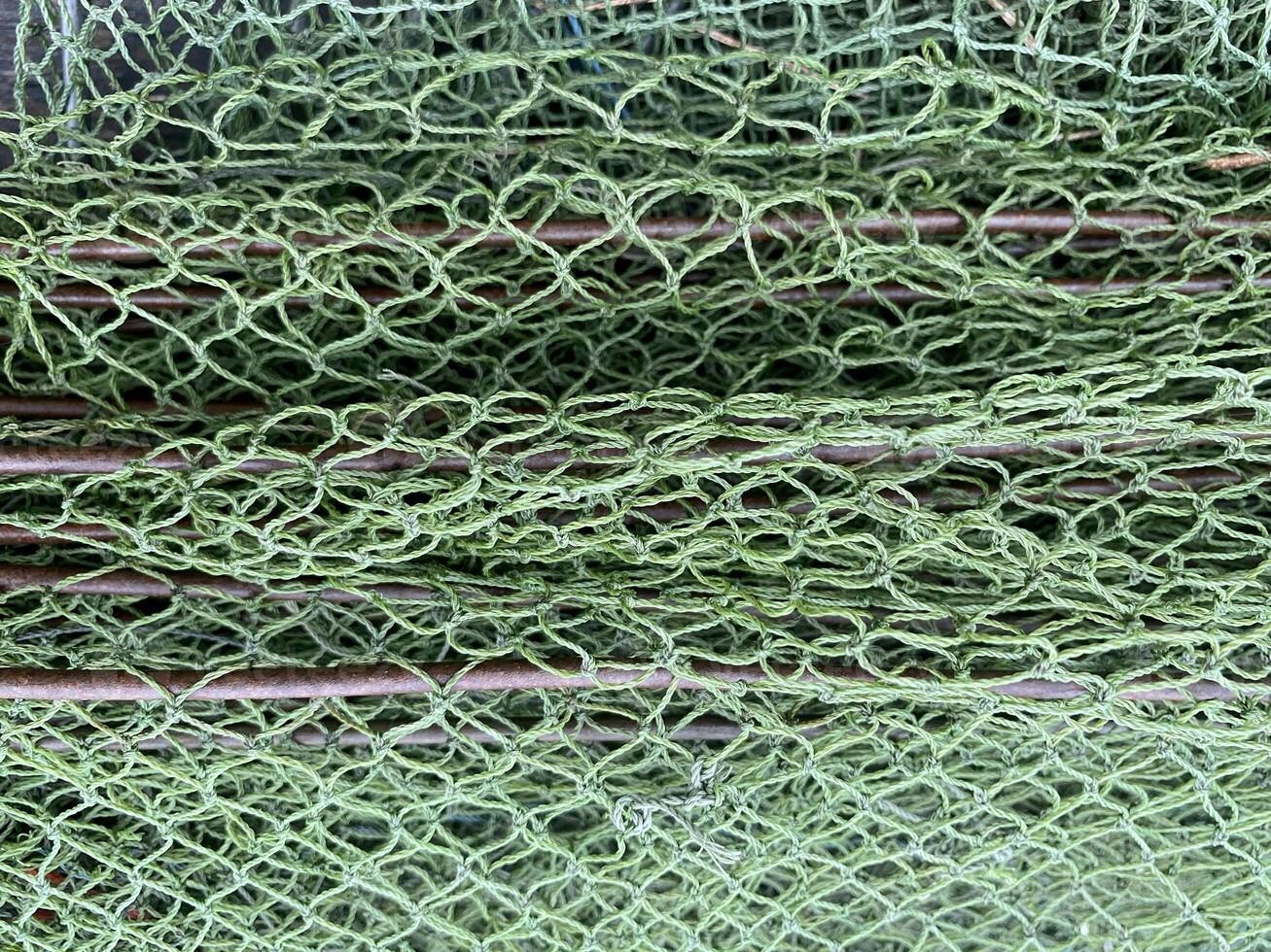 pile of steel wire with fishing net photo