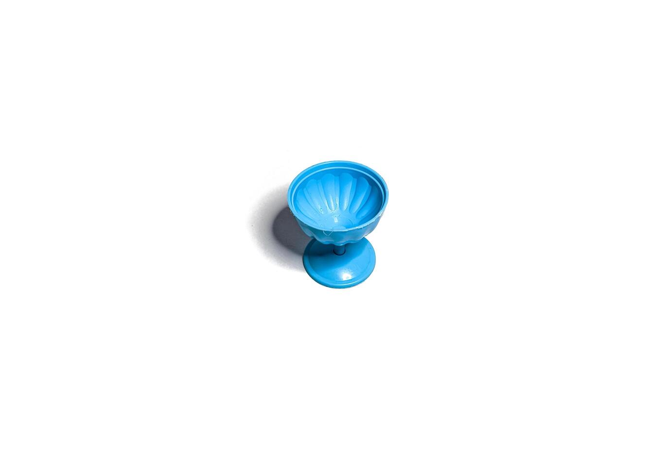 isolated image of an empty blue ice cream cup. shot from the top photo