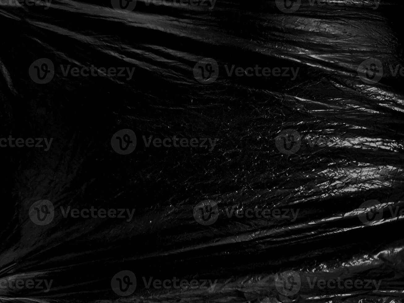 Black transparent plastic wrap texture overlay background. Realistic plastic for poster design and photo overlay effect. Wrinkled plastic surface pattern for graphic design sources and element.